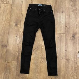 Black skinny jeans by 7 for all mankind